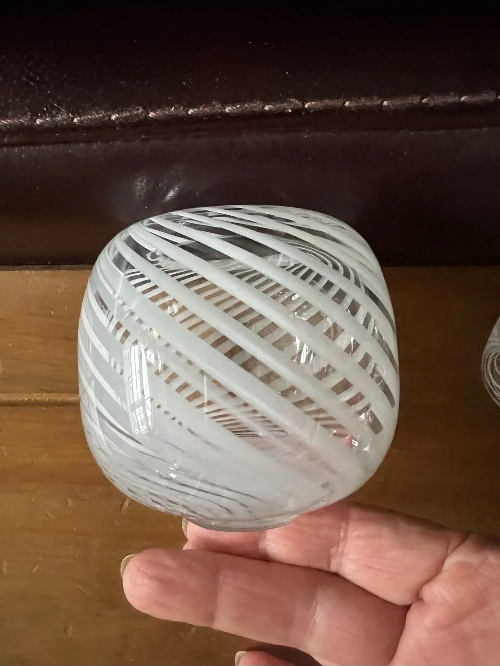 Set of three hand blown vases. Beautiful with white swirls.